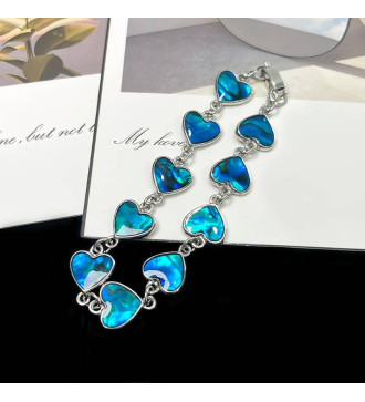 Szív díszes női karkötő, pávakagyló berakással