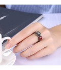 ékszer webshop Fekete virág, rubinpiros kővel díszített gyűrű