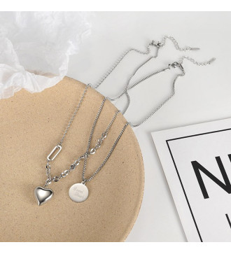 Dupla soros szerencse nyaklánc nemesacélból, szív és kör medállal Dupla soros szerencse nyaklánc nemesacélból, szív és kör medállal